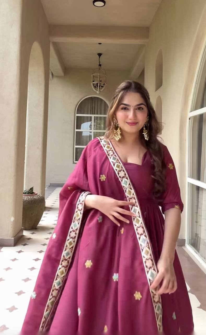 Majestic Wine Flared Anarkali Suit Set Adorned with Delicate Floral Scattered Motifs and an Ornate Heritage Embroidered Border
